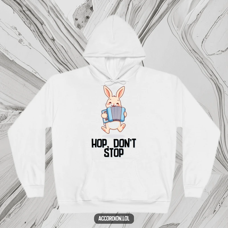 Funny bunny hoodie showing a cheerful bunny hopping and playing a pastel blue accordion with a look of pure glee.