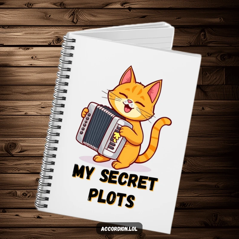 Funny orange cat character holding a pen and playing a shiny silver accordion on a notebook cover.